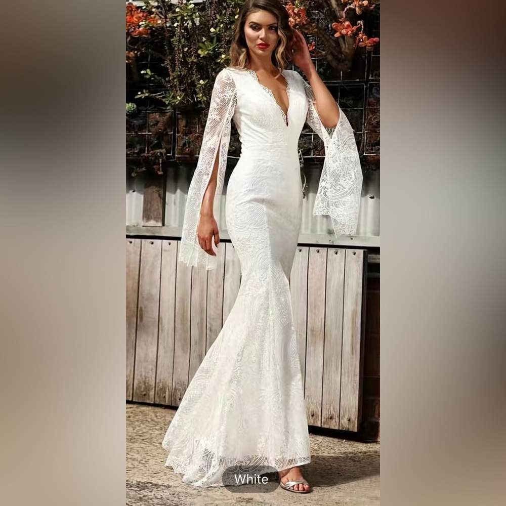 Lace long sleeve wedding dress.